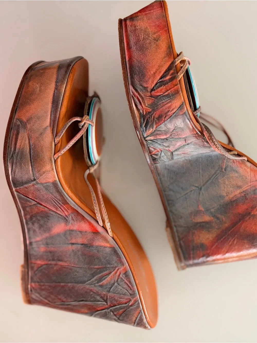 Orange Leather Wedge Slides with Decorative Medallion